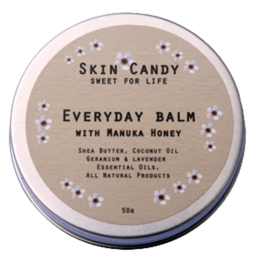 Tin of 'Everyday Balm with Manuka Honey' by Skin Candy on a white background